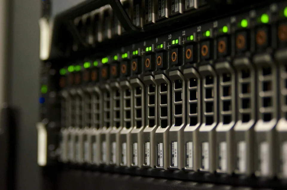 Close-up of drive bays and status lights in rack-mounted servers.
